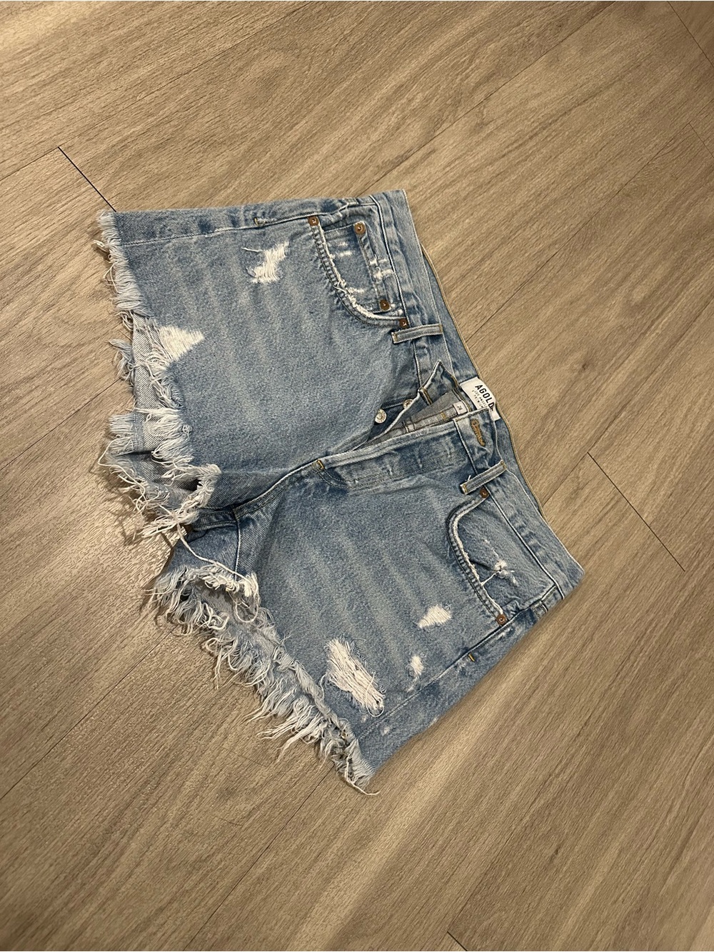 Agolde Light Wash Distressed Denim Cutoff Shorts